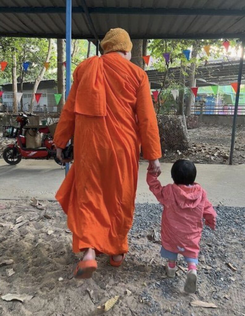 Nun and young child