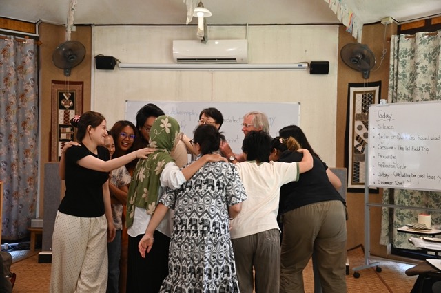 Students learning about socially engaged buddhim